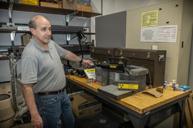 UNLV physics professor Michael Pravica explains the process of using x-rays to extend the life of lithium batteries using an XRS-3 x-ray generator in his lab, Friday May 29,&nbsp;2026.