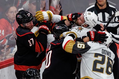 Carolina Hurricanes’ Andrei Svechnikov (37) and Sebastian Aho (20) scuffle with Vegas Golden Knights’ Cole Smith (22) and Nic Dowd (26) during the second period of Game 2 of the NHL hockey Stanley Cup Final series in Raleigh, N.C., Thursday, June 4,&nbsp;2026. 
