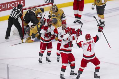 The Carolina Hurricanes celebrate after they score against the Golden Knights during the third period in Game 3 of the NHL hockey Stanley Cup Final in Las Vegas, Thursday, June 4,&nbsp;2026.