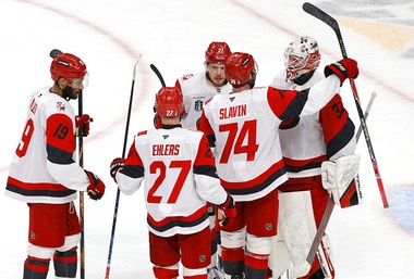 Carolina Hurricanes players celebrate after defeating Vegas Golden Knights in Game 4 of the NHL hockey Stanley Cup Final series at T-Mobile Arena Tuesday, June 9, 2026, in Las Vegas.