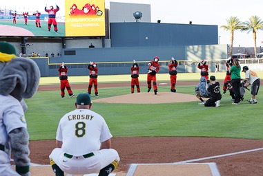 A member of the Jabbawockeez throws out the first pitch before a baseball game between the Athletics and the Colorado Rockies at the Las Vegas Ballpark Saturday, June 13,&nbsp;2026.