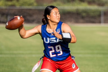 This photo provided by USA Football shows Akemi Higa, a player for the women’s national flag football team, winding up to pass at a USA Football training camp in Chula Vista, Calif., Friday, April 17,&nbsp;2026.

