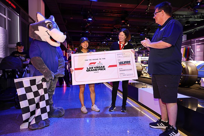Shianne Fontanilla, second from left, and Lori Nelson, senior vice president of community affairs for the Las Vegas Grand Prix, pose with an oversized mockup of two tickets to Formula 1 Heineken Las Vegas Grand Prix 2026, in celebration of Women in Automotive Day, during a ceremony in the Grand Prix Plaza’s Legacy of Formula 1 Room Tuesday, June 30, 2026. Also pictured is Cody the Coyote, the College of Southern Nevada (CSN) mascot, and Scott Bennett, program director of the Department of Applied Technologies and Transportation Technologies at CSN. Fontanilla, a Mercedes-Benz/Snap-on Tools Award recipient, recently graduated from the Master Technician Associate of Applied Science program at CSN.