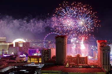 Fireworks explode over Las Vegas Strip casinos as viewed from the High Steaks restaurant patio at the Rio Saturday, July 4, 2026. The synchronized, 8-minute show, launched from nine rooftops, was part of the America250 celebrations.