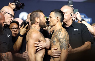 UFC welterweight fighters Conor McGregor, left, and Max Holloway face off during a ceremonial weigh-in for UFC 329 at T-Mobile Arena Friday, July 10, 2026.