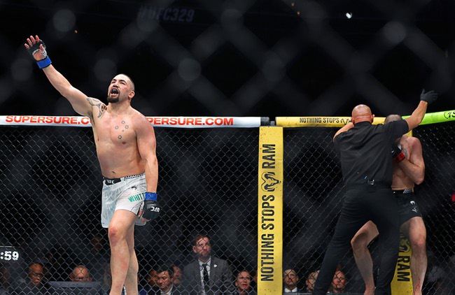 Robert Whittaker celebrates as the referee stops his light heavyweight bout against Nikita Krylov during UFC 329 at T-Mobile Arena Saturday, July 11, 2026. Whittaker won the fight with a third-round TKO.