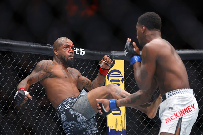 King Green, left, kicks Terrance McKinney in a lightweight bout during UFC 329 at T-Mobile Arena Saturday, July 11, 2026. Green defeated by TKO in the first round.