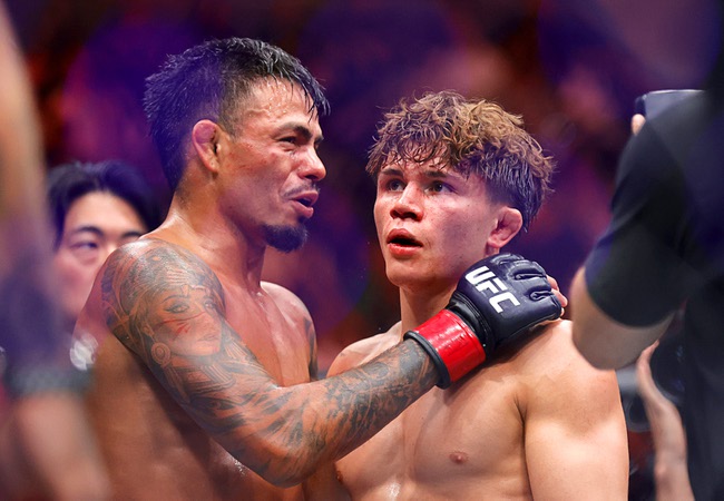 Brandon Royval, left, talks with Lone’er Kavanagh after a flyweight bout during UFC 329 at T-Mobile Arena Saturday, July 11, 2026. Royval defeated Kavanagh by submission in the third round.