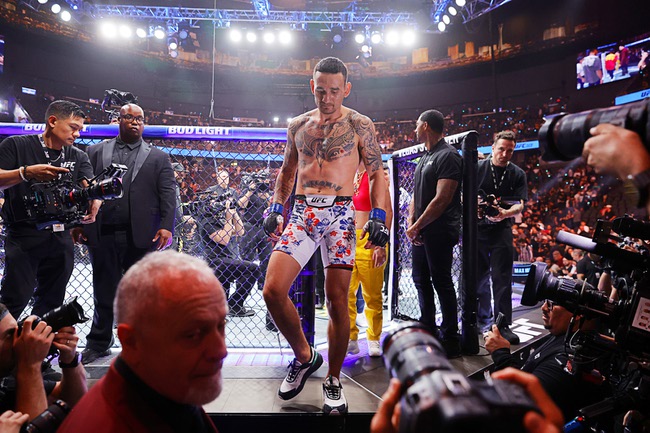 Max Holloway leaves the Octagon after being declared the winner over Conor McGregor during a welterweight fight during UFC 329 at T-Mobile Arena Saturday, July 11, 2026. The fight was stopped in the first round after McGregor injured his knee.