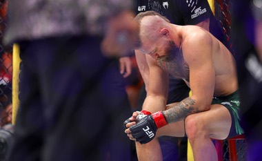 Conor McGregor sits on a stool after injuring his knee and losing a a welterweight fight to Max Holloway during UFC 329 at T-Mobile Arena Saturday, July 11, 2026.