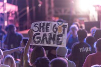 Olympic athletes hit Park MGM to a wall of noise — fans and passersby alike, decked in Team USA gear, shook glittering red and blue pom-poms and waved hand-painted signs to welcome them in.

