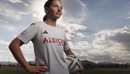 Olive Busby is having a once-in-a-lifetime experience today: attending the World Cup finals not just as a spectator, but as a participant in the on-field pageantry.