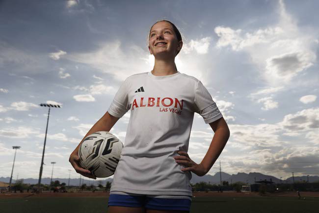 Olive Busby, 13, who will be a flag bearer at the World Cup finals Spain and Argentina game, poses for a photo at the Kellogg Zaher Soccer Complex, Thursday, July 16, 2026.