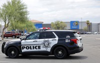 The officer who fatally shot a man carrying a gun in an incident Tuesday at a Walmart Supercenter on Boulder Highway has been identified by Metro Police ...