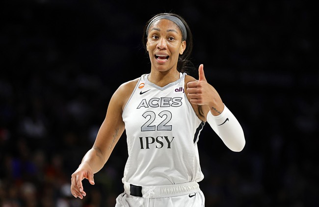 Las Vegas Aces center A'ja Wilson (22) gives a thumbs up during the first half of an WNBA basketball game against the Portland Fire at Michelob Ultra Arena in Mandalay BayTuesday, July 28, 2026.