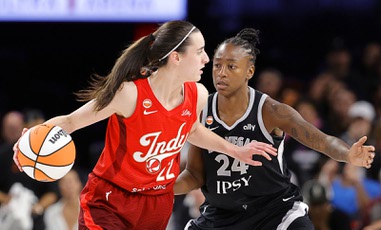 Las Vegas Aces guard Jewell Loyd (24) defends against Indiana’s Caitlin Clark at Michelob Ultra Arena on July&nbsp;12.