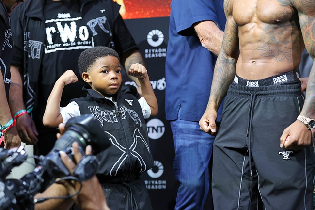 Amari Roach, 4, son of boxer Lamont Roach Jr., poses during a ceremonial weigh-in at Virgin Las Vegas Friday, July 31, 2026. Lamont Roach Jr. and William Zepeda are scheduled to fight for a vacant WBC lightweight title at the  hotel-casino Saturday.