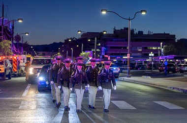 A Metro Police honor guard takes part in a procession from University Medical Center to the Clark County Coroner’s Office after a Metro Police officer was shot and killed Tuesday, Aug. 4,&nbsp;2026.
