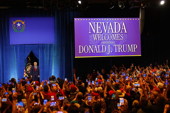 President Donald Trump, left, arrives to speak during a rally at Red Rock Casino Wednesday, Aug. 5, 2026.