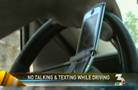 Law bans cell phone use while driving