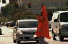 Turkey-outfitted officer crosses road to raise traffic safety awareness