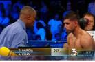 Garcia stops Khan